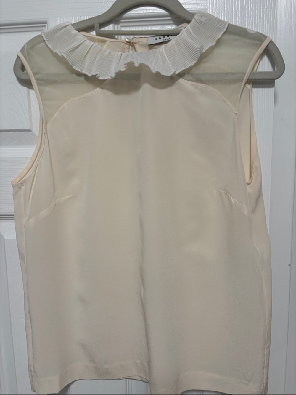 Sleeveless Ivory Ruffled-Collar Blouse